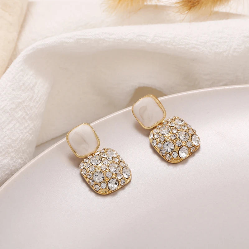 purple crystal geometric earrings