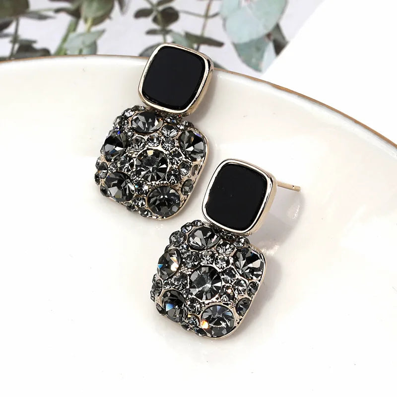 purple crystal geometric earrings